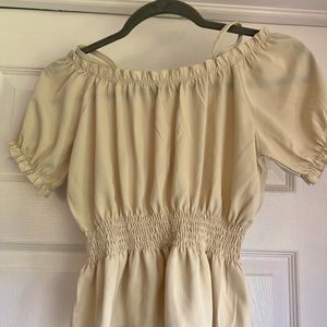 Silky girls small flared waist cream blouse.